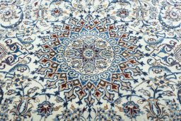 Central medallion detail of 2000s Nain rug from Iran / Persia