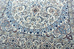 Close-up detail of 2000s Nain rug from Iran / Persia showing Wool weave