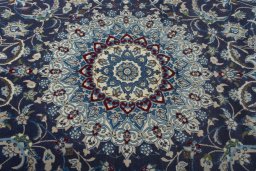 Central medallion detail of 2000s Nain rug from Iran / Persia