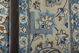 Backside of handmade 2000s Nain rug showing knot structure and weave density