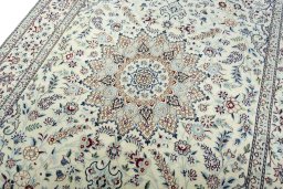 Backside of handmade 2000s Nain rug showing knot structure and weave density