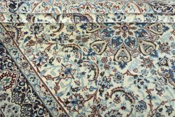 Close-up detail of 2000s Nain rug from Iran / Persia showing Wool weave