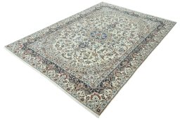 Corner detail of 2000s Nain rug showing border pattern and Wool pile