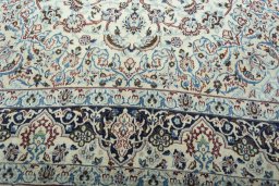 Close-up detail of 2000s Nain rug from Iran / Persia showing Wool weave