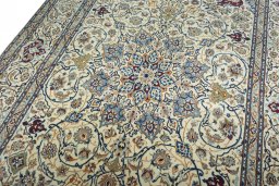 Backside of handmade 2000s Nain rug showing knot structure and weave density