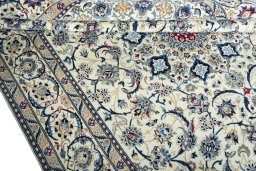 Close-up detail of 2000s Nain rug from Iran / Persia showing Wool weave
