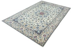 Corner detail of 2000s Nain rug showing border pattern and Wool pile