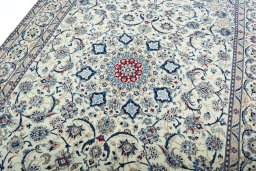 Backside of handmade 2000s Nain rug showing knot structure and weave density