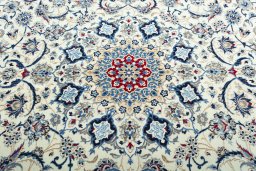 Central medallion detail of 2000s Nain rug from Iran / Persia