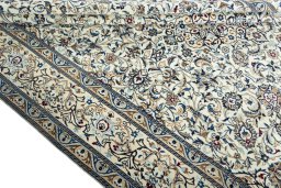 Close-up detail of 2000s Nain rug from Iran / Persia showing Wool weave
