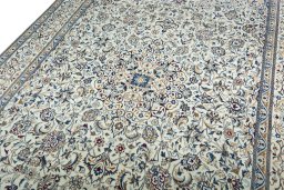 Backside of handmade 2000s Nain rug showing knot structure and weave density