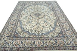 Surface texture of 2000s Nain rug with natural Wool and intricate pattern