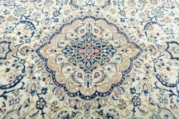 Central medallion detail of 2000s Nain rug from Iran / Persia