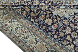Close-up detail of 1970s Nain rug from Iran / Persia showing Wool weave