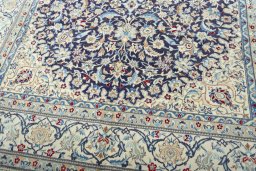Close-up detail of 1970s Nain rug from Iran / Persia showing Wool weave
