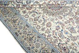 Close-up detail of 2000s Nain rug from Iran / Persia showing Wool weave