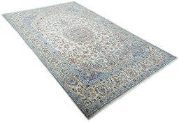 Close-up detail of 2000s Nain rug from Iran / Persia showing Wool weave