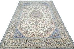 Surface texture of 2000s Nain rug with natural Wool and intricate pattern