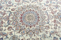 Central medallion detail of 2000s Nain rug from Iran / Persia