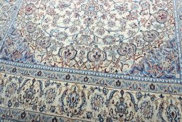 Close-up detail of 2000s Nain rug from Iran / Persia showing Wool weave