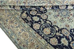 Close-up detail of 2000s Nain rug from Iran / Persia showing Wool weave
