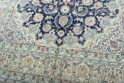 Close-up detail of 2000s Nain rug from Iran / Persia showing Wool weave