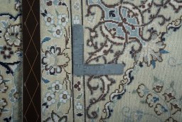 Backside of handmade 2000s Nain rug showing knot structure and weave density