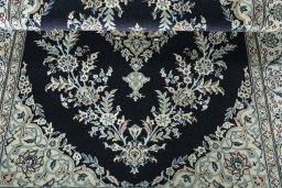 Corner detail of New Nain rug showing border pattern and Cork pile