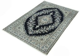 Corner detail of New Nain rug showing border pattern and Cork pile