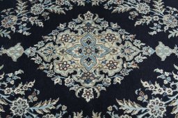 Central medallion detail of New Nain rug from Iran / Persia