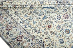 Close-up detail of 2000s Nain rug from Iran / Persia showing Wool weave