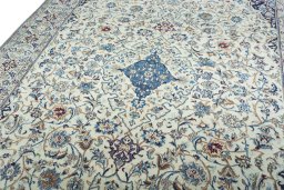 Backside of handmade 2000s Nain rug showing knot structure and weave density