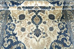 Close-up detail of 2000s Nain rug from Iran / Persia showing Wool weave