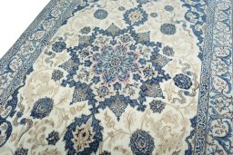Backside of handmade 2000s Nain rug showing knot structure and weave density