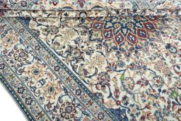 Close-up detail of 2000s Nain rug from Iran / Persia showing Wool weave