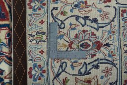 Backside of handmade 2000s Nain rug showing knot structure and weave density