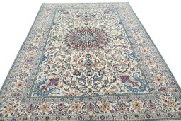 Surface texture of 2000s Nain rug with natural Wool and intricate pattern