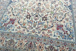 Close-up detail of 2000s Nain rug from Iran / Persia showing Wool weave