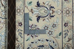 Backside of handmade 2000s Nain rug showing knot structure and weave density