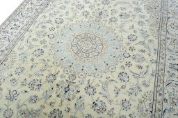 Backside of handmade 2000s Nain rug showing knot structure and weave density
