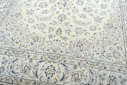 Close-up detail of 2000s Nain rug from Iran / Persia showing Wool weave