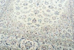 Close-up detail of 2000s Nain rug from Iran / Persia showing Wool weave