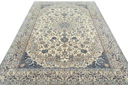 Surface texture of 2000s Nain rug with natural Wool and intricate pattern