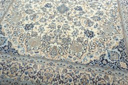Close-up detail of 2000s Nain rug from Iran / Persia showing Wool weave