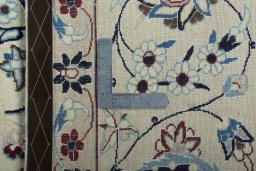 Backside of handmade 2000s Nain rug showing knot structure and weave density