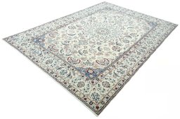 Corner detail of 2000s Nain rug showing border pattern and Wool pile