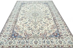 Surface texture of 2000s Nain rug with natural Wool and intricate pattern