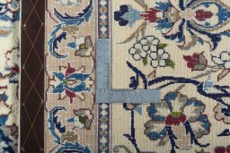 Backside of handmade 2000s Nain rug showing knot structure and weave density