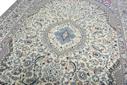Backside of handmade 2000s Nain rug showing knot structure and weave density