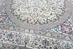 Close-up detail of 2000s Nain rug from Iran / Persia showing Wool weave